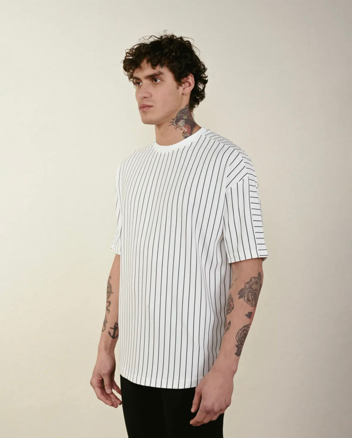 White t-shirt with black vertical stripes 