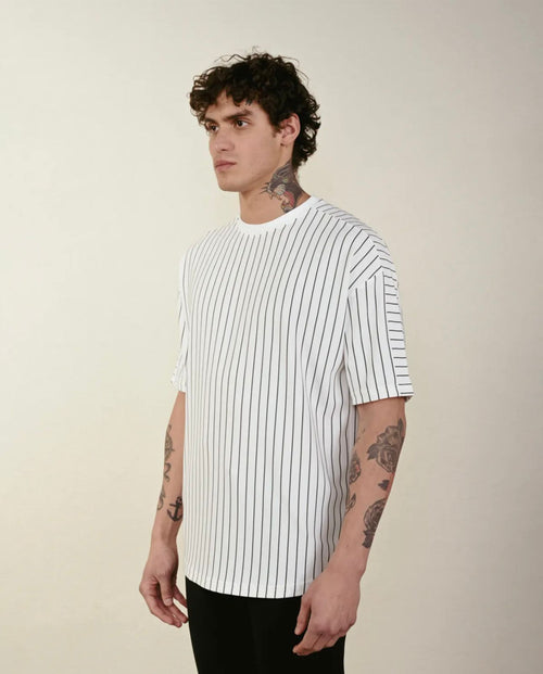 White t-shirt with black vertical stripes 